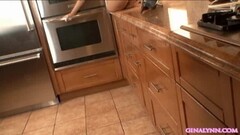 Gina Lynn posing in the kitchen BTS Thumb