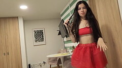 Beautiful woman in a red skirt and without underwear, wants to be fucked as a Christmas gift Thumb