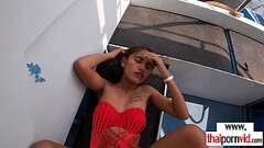 Skinny amateur Thai teen Cherry fucked on a boat by a big european cock Thumb